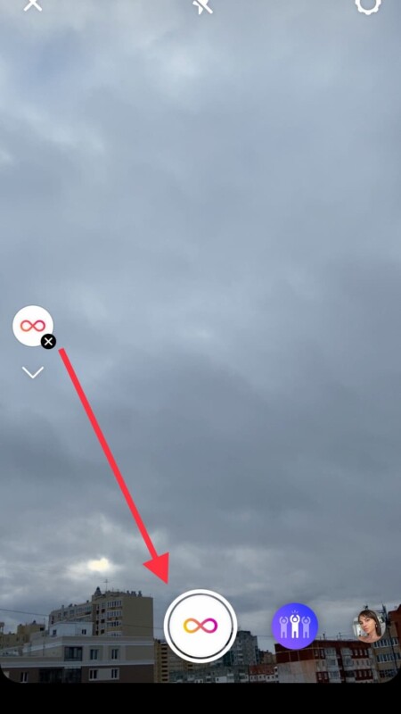 Нажмите на кнопку в нижней части экрана, чтобы сделать серию фото