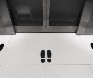 Black footprint sticker for social distancing in e 8LFPFW8