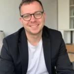 Илья Чумаченков, Основатель ИИ-агентства IIMATES